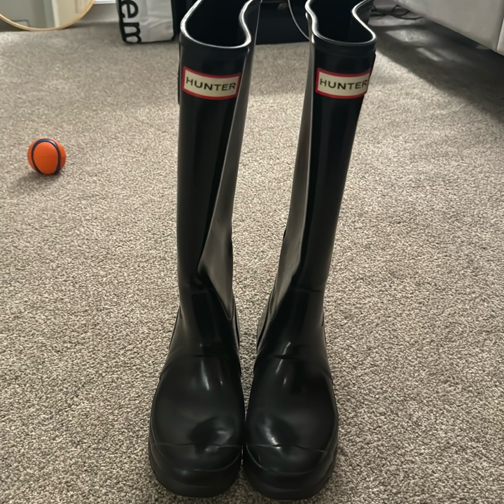 Tall black hunter rain boots